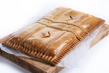 Tuna pie (empanada gallega) isolated on white background