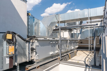 Ventilation and air conditioning system on the roof of the building. Volumetric metal .air ducts.