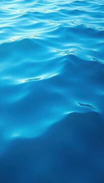 Abstract blue water surface, gentle ripples, serene texture, aqua background, ocean background