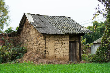 Fototapeta premium Abandoned mud-walled houses in the countryside