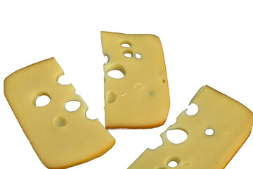 Pieces of cheese Maasdam Netherlands isolated on black background.