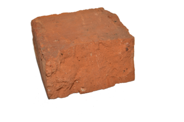 Half of red clay brick lies on transparent background. PNG background.
