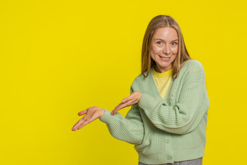 Woman raising hands asking what why reason of failure, demonstrating disbelief irritation by...