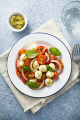 Tomato salad with red onion and cheese