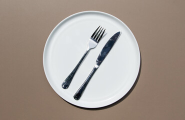 Minimal Ceramic Plate from Above as Symbol of Table Etiquette