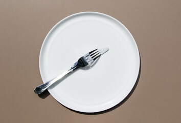 Minimal Ceramic Plate from Above as Symbol of Table Etiquette