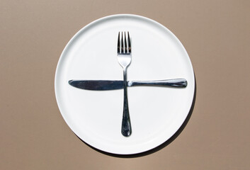 Minimal Ceramic Plate from Above as Symbol of Table Etiquette