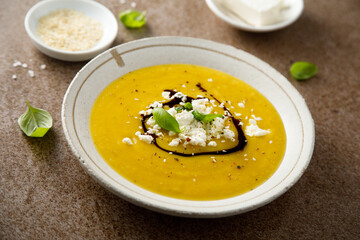 Homemade pumpkin soup with Feta cheese