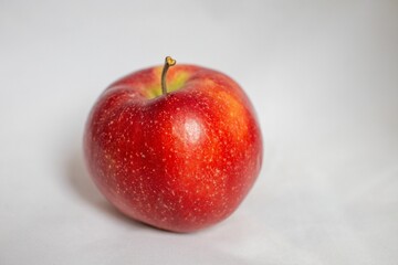 Bright red apple isolated on a white background