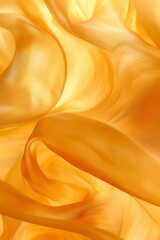 Obraz premium Abstract golden fabric texture, flowing silk waves.