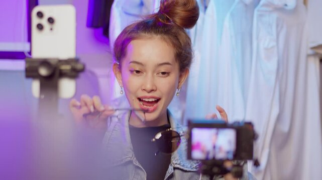 A beauty influencer showcases a live makeup tutorial engaging viewers with tips and techniques.