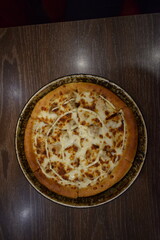 pizza on a wooden board