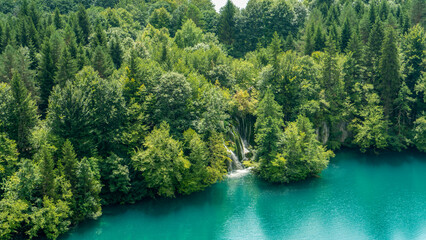 Transparent Turquoise Colored Waters of the Lake Are Having Ripples. Many Small Waterfalls Flowing...
