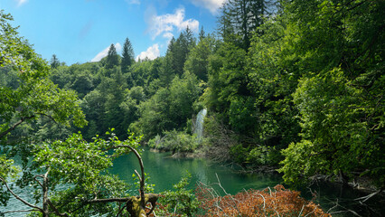 Transparent Turquoise Colored Waters of the Lake Are Having Ripples. Many Small Waterfalls Flowing...