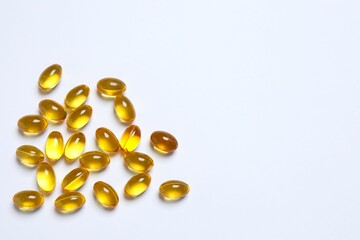 Capsule of omega 3, 6, 9 fish oil, vitamin, food supplement on white background 