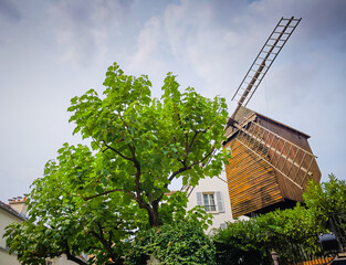 Moulin de la Galette, an old windmill in Montmartre, Paris, France. Close up photo of a mill