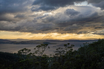 dawn golden sunrise over hobart over the ocean