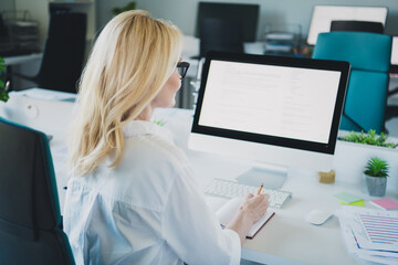 Photo of successful manager business analytic blonde lady wearing formal white shirt looking into...