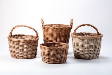 Obraz premium Empty wicker baskets on a white backdrop