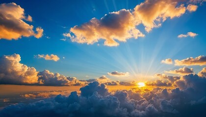 Fototapeta premium Golden Hour Above the Clouds: A breathtaking aerial view of a golden sunset bursting through the clouds, painting the sky in vibrant hues of orange, pink, and blue.