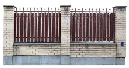 Old aged fence made of wooden planks and steel bars isolated