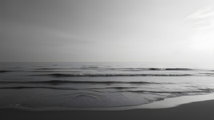 Obraz premium Serene Minimalist Black and White Beach Scene, Calm Sea, Tranquil Ocean Waves, Peaceful Coastal Landscape