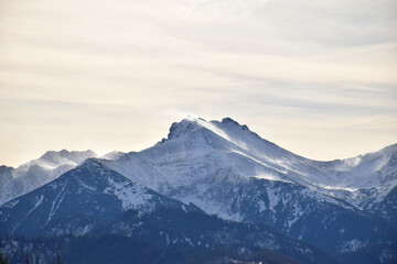 Snow-Dusted High Tatras Mountain Peaks with Misty Alpine Air