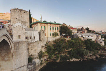 Obraz premium Historical Mostar Bridge, 16th-century Ottoman Bridge at night, also known as Stari Most or Old Bridge in Mostar, Bosnia Herzegovina