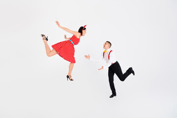 Photo of attractive couple professional dancers choreographers waltz performance isolated on white color background