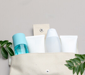 Beauty products arranged in a colorful flat lay, emphasizing skincare and cosmetic essentials.
