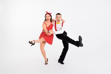 Photo of crazy attractive active couple pair professional dancers in dance battle isolated on white...