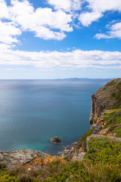 View of blue ocean from the top of a cliff