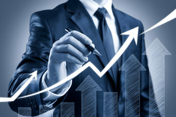 Suited individual poised to sketch arrows symbolize growth, futuristic vibe