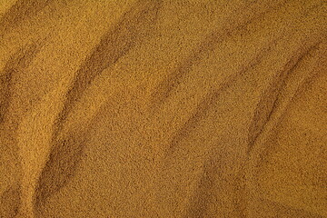 Background of instant coffee closeup, banner. Coffee powder texture, top view. Ground, instant coffee background, texture, top view. Texture of brown coffee powder, banner.