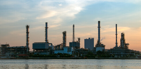 Fototapeta premium Oil and Gas Industrial zone,The equipment of oil refining,Close-up of industrial pipelines of an oil-refinery plant,Detail of oil pipeline with valves in large oil refinery.
