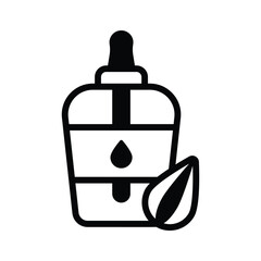 Obraz premium A bottle of almond oil with a dropper, ready to use icon of almond oil