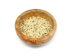 Shelled Hemp Seed in a wooden bowl isolated on white. Hemp hearts isolated - Healthy Nutrition