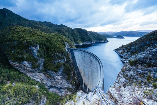 View of the Gordon Dam on a cool summer's day. It is a unique double curvature concrete arch dam