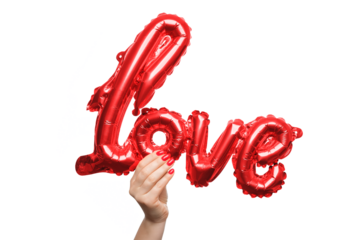 Holding a shiny red love balloon against a white background. A hand extends upward, presenting a vibrant, shiny red balloon shaped like the word love.