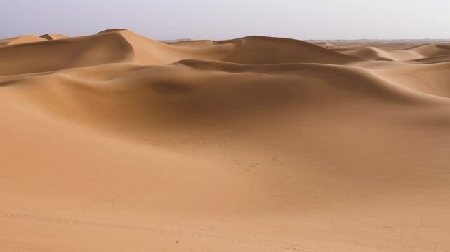 Beautiful Sahara desert sand dunes, Erg Lihoudi, Morocco. Serene beautiful landscape and nature background 4k footage. 
