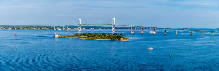 A panorama view past Rose Island towards the bridge in Newport, USA in the fall