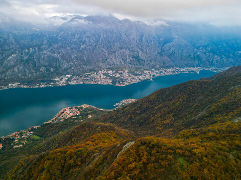 Mountain fjord bay valley horizontal panorama autumn forest wilderness nature landscape view.
