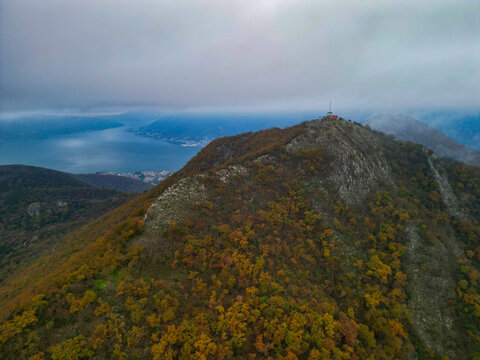 Mountain fjord bay valley horizontal panorama autumn forest wilderness nature landscape view.
