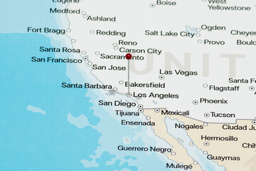 Macro photo of red pin needle into Los Angeles city of United States of America political map 