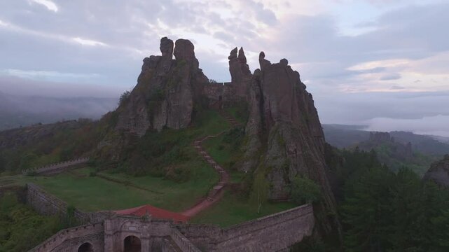 Aerial view of belogradchik fortress at sunrise surrounded by majestic rock formations, belogradchik, bulgaria.