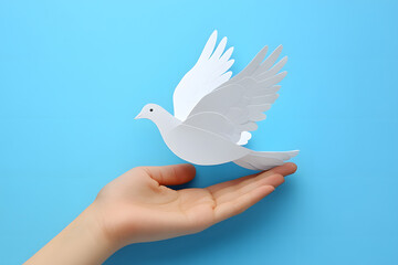 Obraz premium Praying hands and white dove flying happily on blurred background with sunset , hope and freedom concept. 