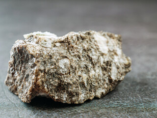 Close-up of granite stone on gray background