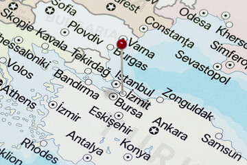 Macro photo of a red pin needle into Izmit city of Turkey political map 