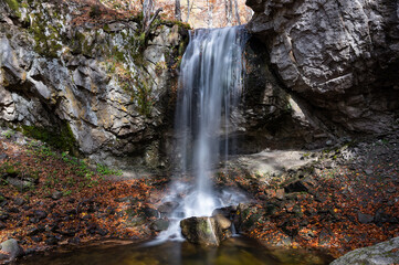 Obraz premium View of the waterfall of Achladochori in the virgin forest of Frakto in Macedonia, Greece