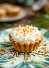 A slice of bee sting cake with almond topping and vanilla filling, served with honey.

